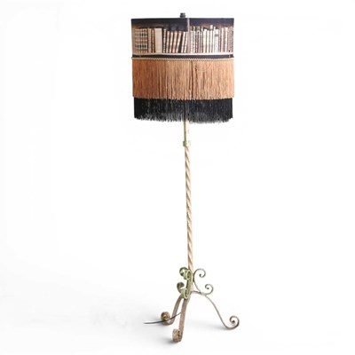 Lot 120 - A wrought iron standard lamp, with a modern...