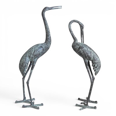 Lot 239 - A cast metal garden sculpture of a crane, 81cm...