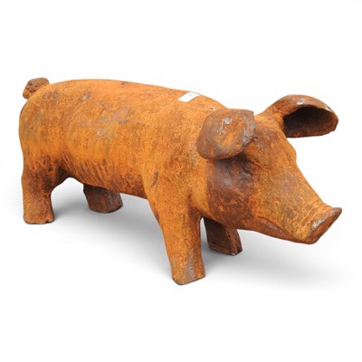Lot 278 - A rusted metal garden statue of a pig, 44cm long