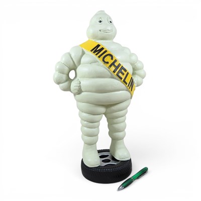 Lot 455 - A large painted metal model of the Michelin...