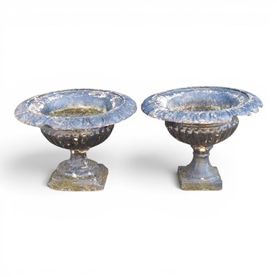 Lot 188 - A pair of black painted cast iron garden urns,...