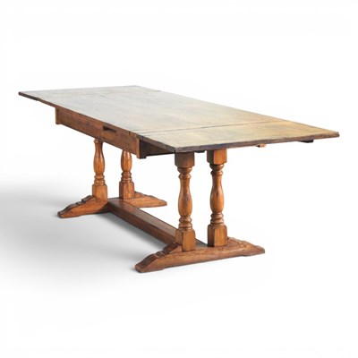 Lot 500 - A mid 20th century draw leaf oak refectory...