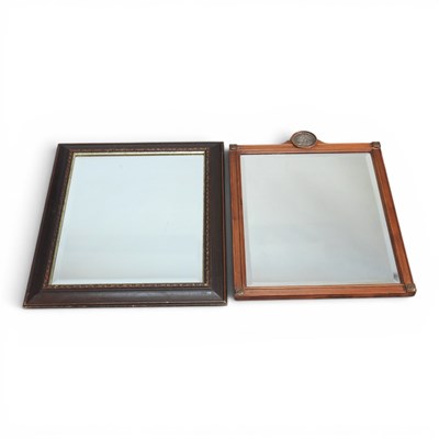 Lot 411 - A wall mirror, inset with a medallion, 63 x...