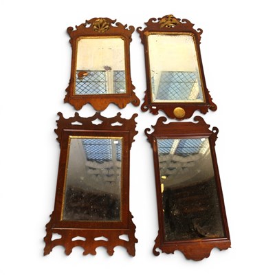Lot 254 - Four George III style fret carved mahogany...