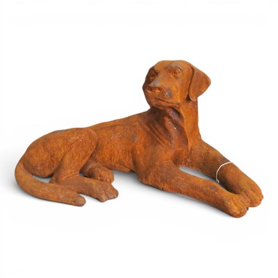 Lot 80 - A rusted metal garden statue of a resting gun...