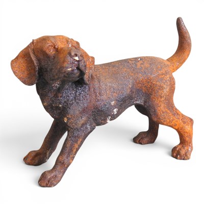 Lot 632 - A small rusted metal figure of a puppy, 31cm long
