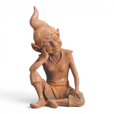 Lot 640 - A rusted cast metal garden statue of a...