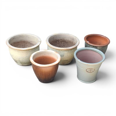 Lot 584 - A collection of five various glazed garden...