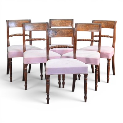 Lot 576 - A set of six Regency mahogany rope back dining...
