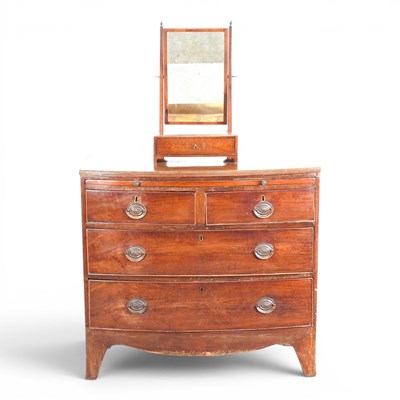 Lot 510 - A 19th century mahogany bow front chest,...