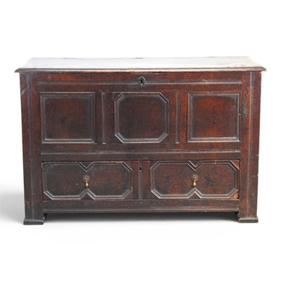 Lot 154 - An 18th century oak mule chest, with a hinged...