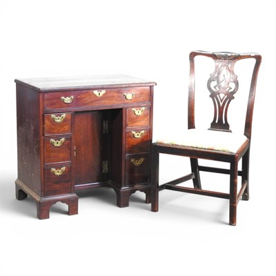 Lot 305 - A George III mahogany kneehole desk, of small...