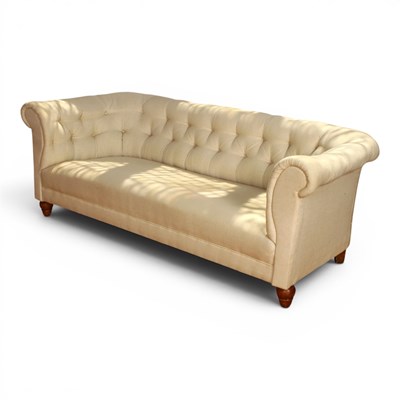 Lot 536 - A white upholstered Chesterfield type sofa