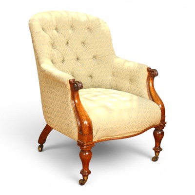 Lot 520 - A Victorian button back mahogany armchair