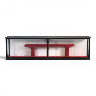 Lot 68 - An ebonised display cabinet, with a velvet...