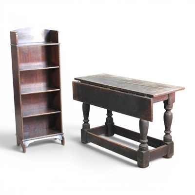 Lot 668 - An 18th century oak side table, 114cm wide,...