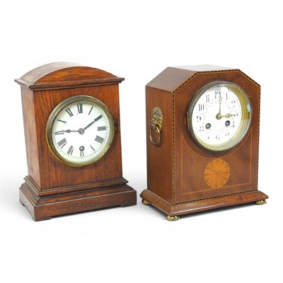 Lot 511 - An Edwardian mahogany and inlaid mantel clock,...