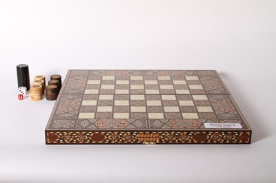 Lot 182 - A Damascus type inlaid folding games box,...