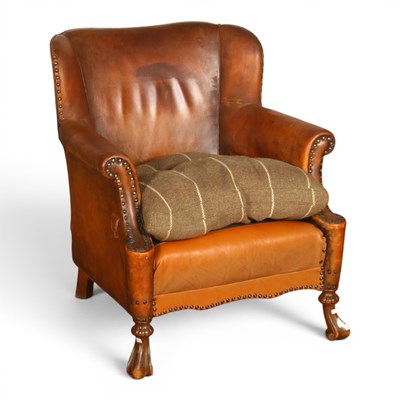Lot 620 - An early 20th century brown leather...
