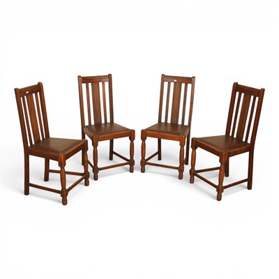 Lot 608 - A set of four early 20th century oak dining...