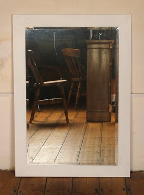 Lot 938 - A white painted wooden wall mirror, 106x75cm