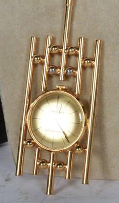 Lot 124 - A Corocraft yellow metal watch pendant, having...
