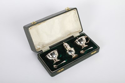 Lot 11 - A La Croute silver salt pepper and mustard set,...