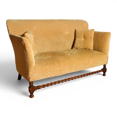 Lot 590 - An early 20th century oak framed sofa, W131cm
