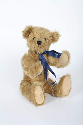 Lot 664 - A Deans Rag Book mohair teddy bear with blue...