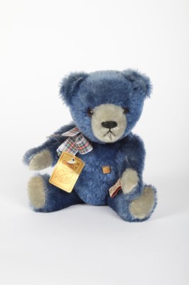 Lot 669 - A Grisly blue mohair teddy bear with checked...