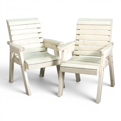 Lot 667 - A pair of wooden garden armchairs, each with a...