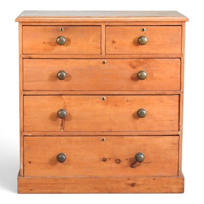 Lot 543 - An early 20th century pine chest, containing...