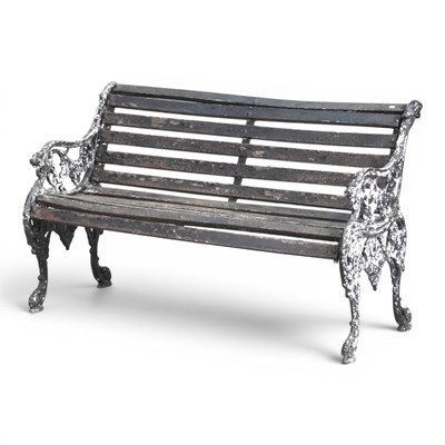 Lot 83 - A Coalbrookdale style cast iron garden bench,...