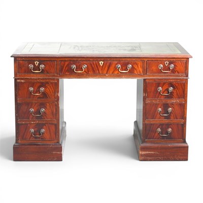 Lot 467 - A reproduction mahogany pedestal desk, with an...