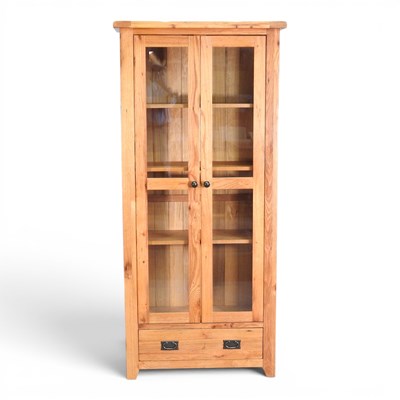 Lot 666 - A modern oak bookcase, with adjustable shelves,...