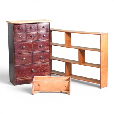 Lot 570 - A lacquered chest, containing an arrangement...
