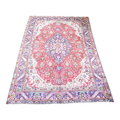 Lot 570 - A Persian tabriz carpet, having a large...