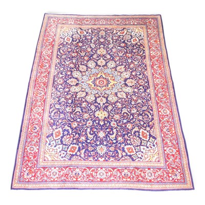 Lot 416 - A Persian kashan carpet, with a central...