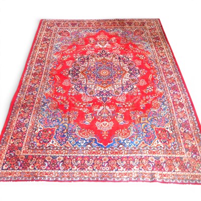 Lot 89 - A Persian meshed carpet, with a large central...