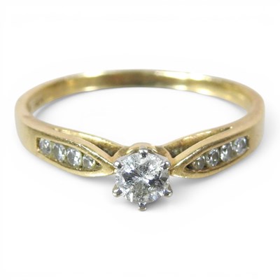 Lot 4 - A 14 carat gold diamond solitaire, with...