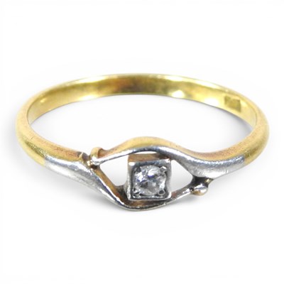 Lot 12 - A 9 carat gold diamond ring, of bypass design,...
