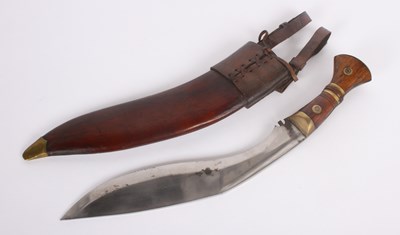 Lot 127 - A Gurkha kukri knife, circa 1917, in a tan...