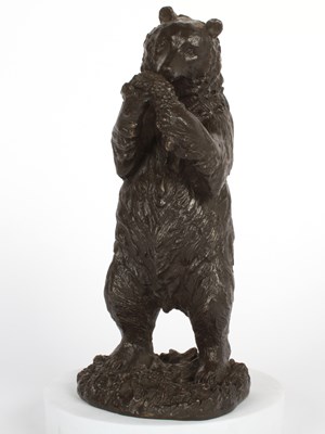 Lot 225 - A bronze model of a bear, shown standing