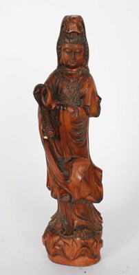 Lot 296 - A Chinese carved wood figure of Guan Yin,...