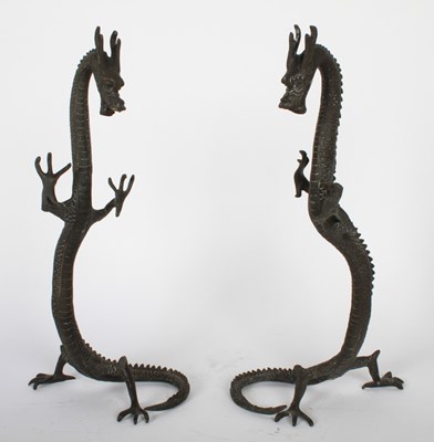 Lot 226 - A pair of Chinese bronze models of dragons,...