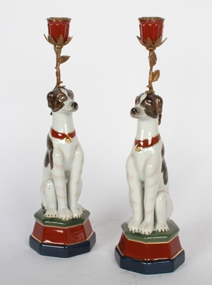 Lot 131 - A pair of porcelain table candlesticks, each...