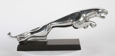 Lot 186 - A desk ornament, in the form of a Jaguar car...
