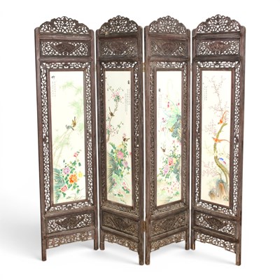 Lot 86 - A Chinese fret carved hardwood four fold...