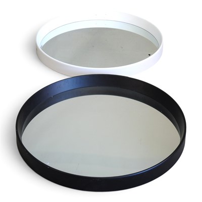 Lot 579 - A modern circular wall mirror, with a black...