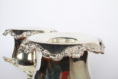 Lot 46 - A pair of silver plated wine coolers, each in...